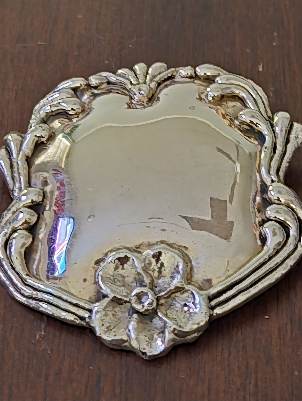 Ornate Silver-Tone Decorative Metal Medallion with Floral Accent